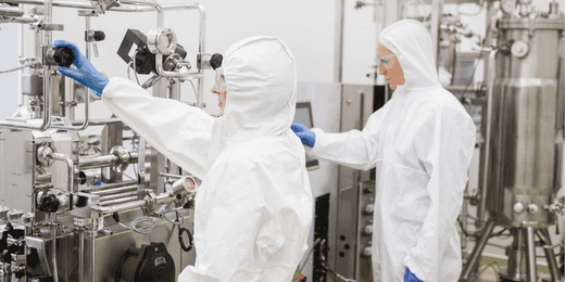 Workers using process equipment at work