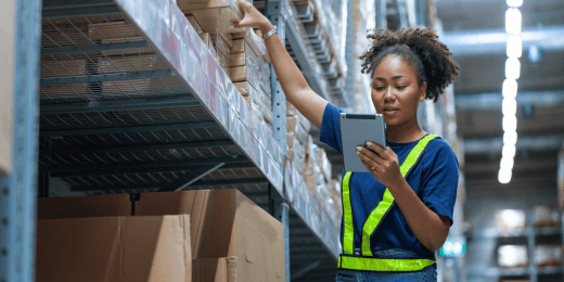 A shopkeeper practicing retail asset management best practices using a software solution