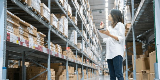 A manager doing inventory replenishment checks