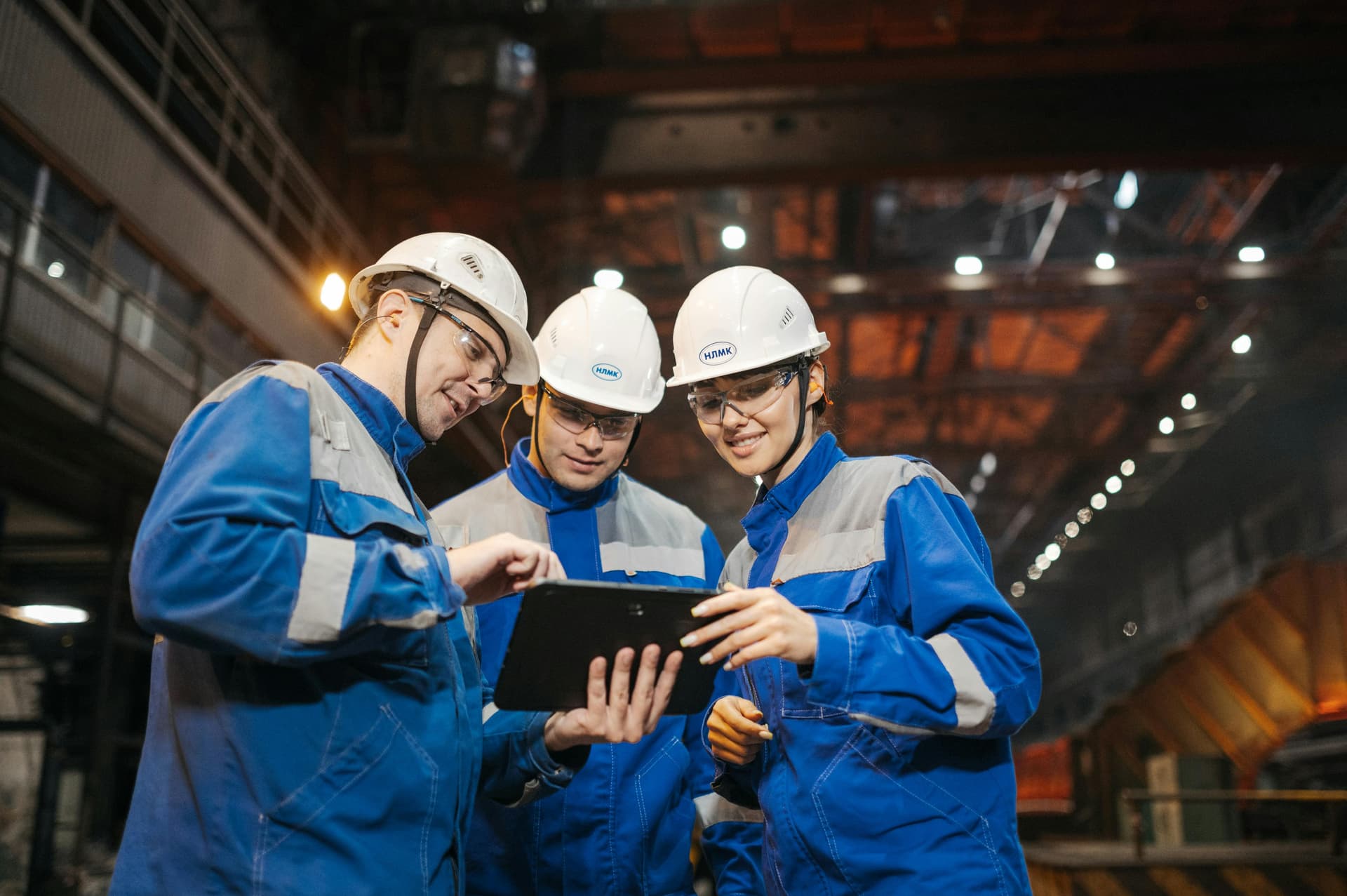 A group of 3 workers using SafetyCulture—a smarter Connecteam alternative to manage checks, training, and issues in one app and keep frontline teams aligned.