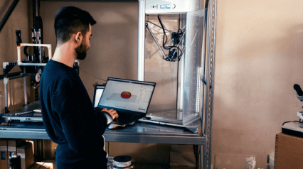 a man learning 3D printing