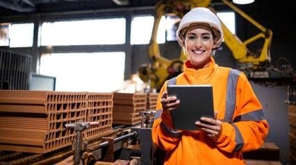 a quality engineer using an app on a tablet to conduct quality improvement process