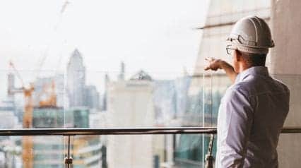 a construction manager overseeing a leed certified building being maintained