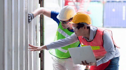 auditors performing safety audits on work premises