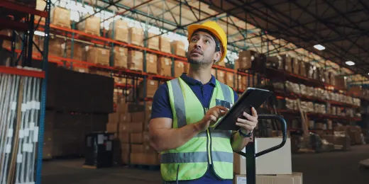 An inspector using an audit walkthrough checklist