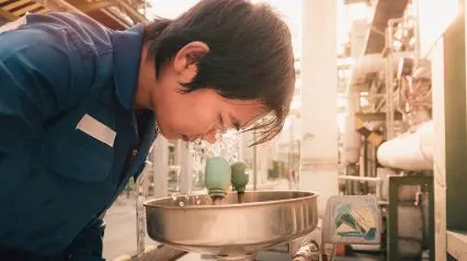 an employee using an emergency eyewash station that was previously inspected for safety using an emergency eye wash station checklist|Emergency Eye Wash Station Checklist Sample Report|Emergency Eye Wash Station Checklist