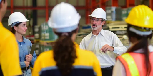 A manager using a visitor safety induction template