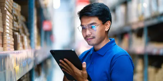 A security specialist performing checks using a retail security checklist